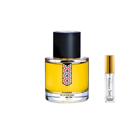 Les Indémodables Ambre Suprême retail bottle with Radiance Fragrance 5 mL sample